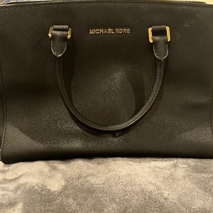 Micheal Korda Black Leather/ gold hardware Handbag with detachable strap